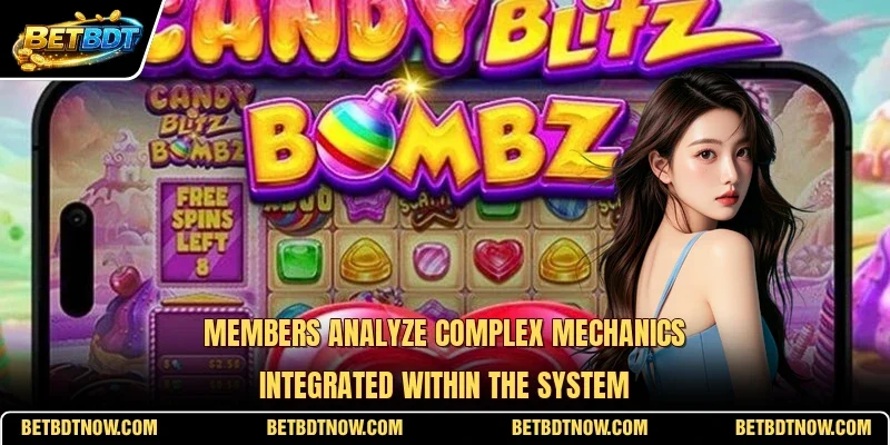 Members analyze complex mechanics integrated within the system